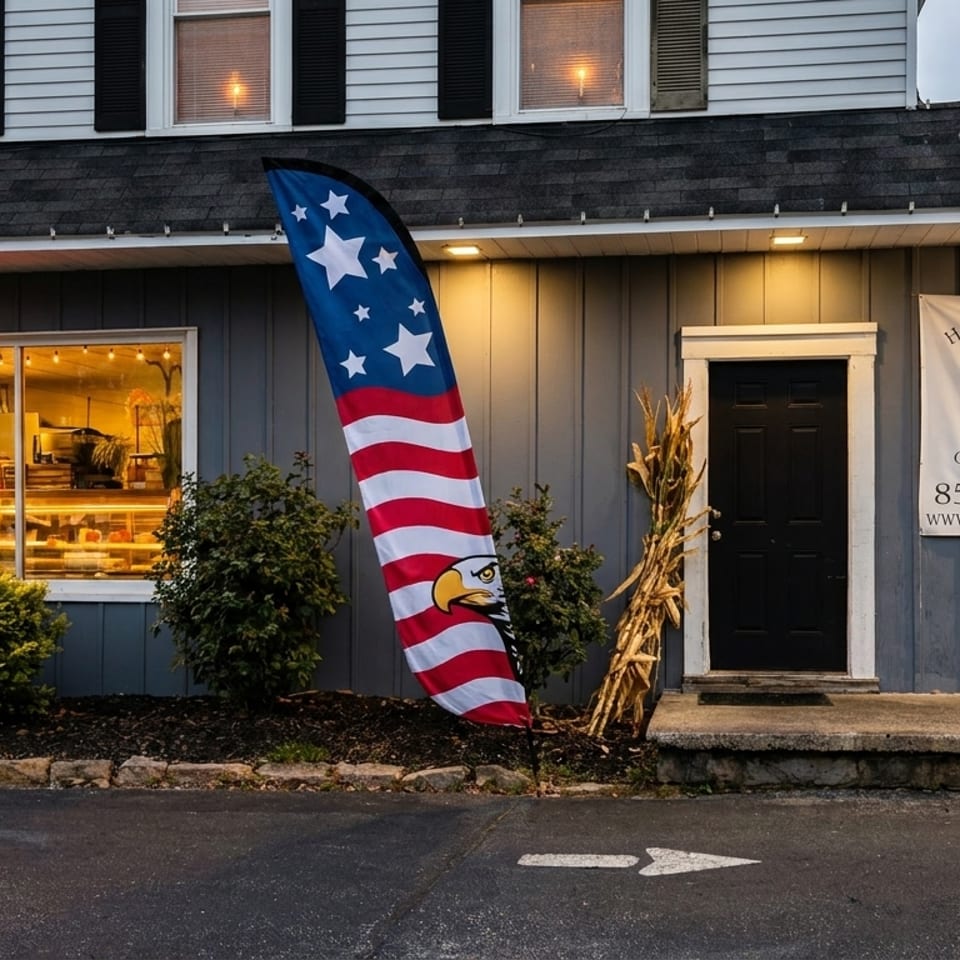 Louie's Roast Beef restaurant exterior with an "OPEN" sign, an American flag banner, and a business sign.